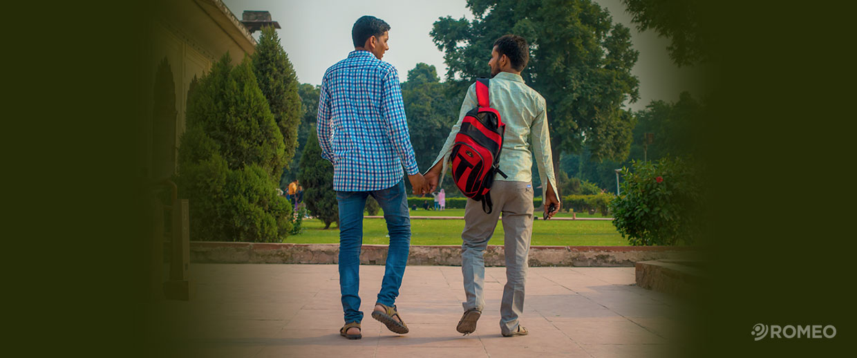 India's Supreme Court Decriminalizes Gay Sex Two men holding hands in a garden